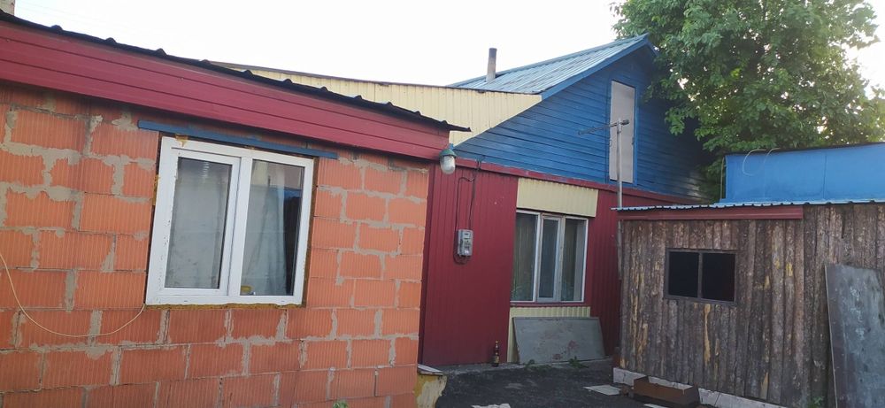 Дом продам с большим гаражом срочно