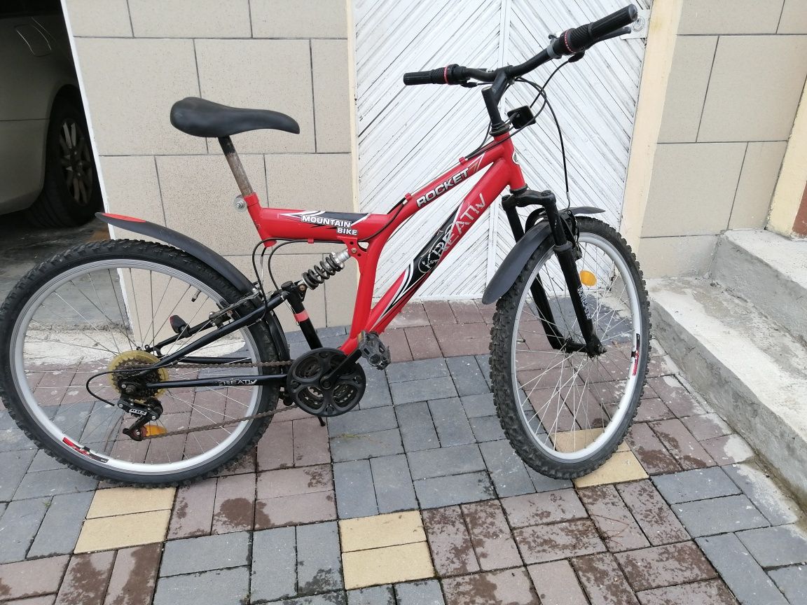 Vând bicicleta MBT cu suspensii