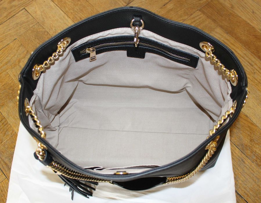 Дамската чанта Gucci Soho