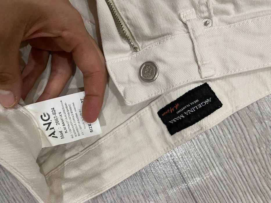 Женская джинсы  в отличном состоянии