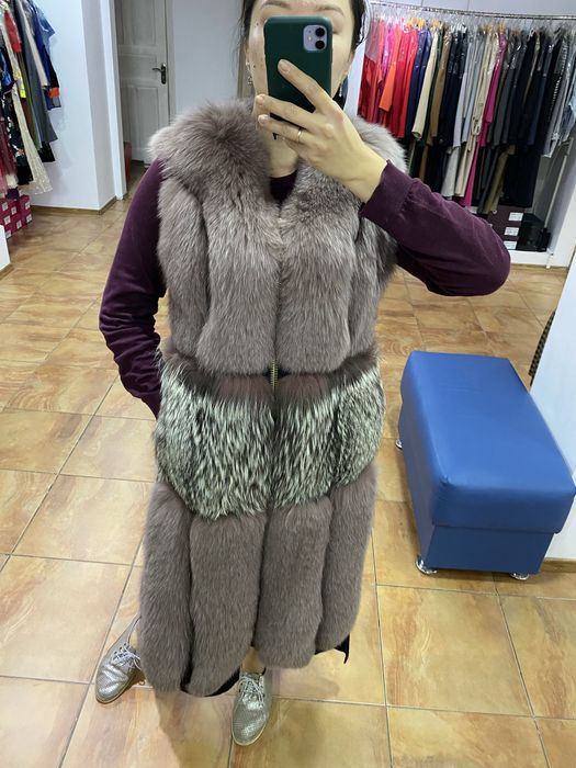 Продам меховую жилетку новую