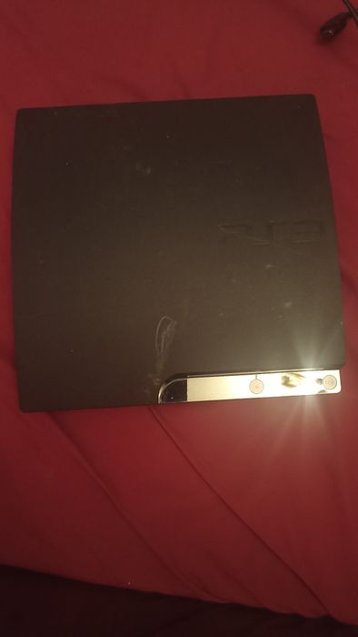 PS3 slim с 2 игри