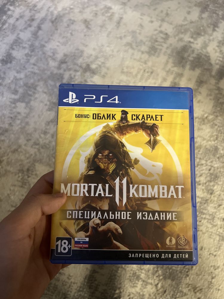 Обменяю игру Ps 4 мортол комбат на UFC