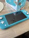 Nintendo switch lite + 2 игри