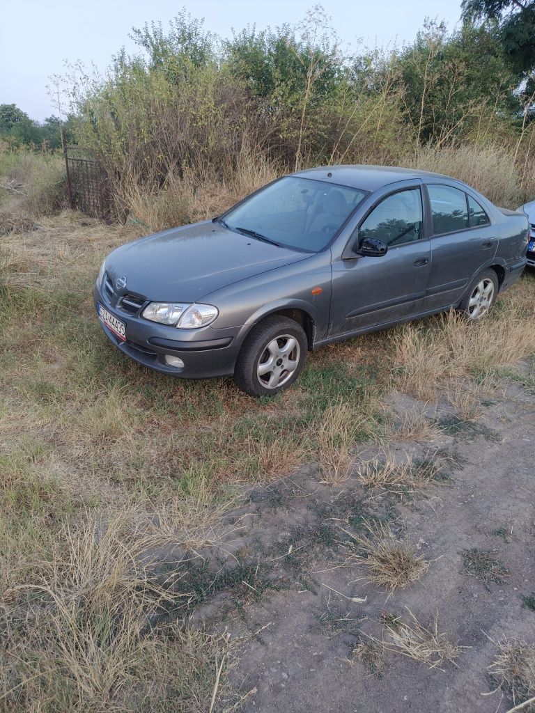 Nissan Almera  1.8 газ бензин