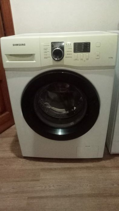 Стиральная машина.  Состояние нового