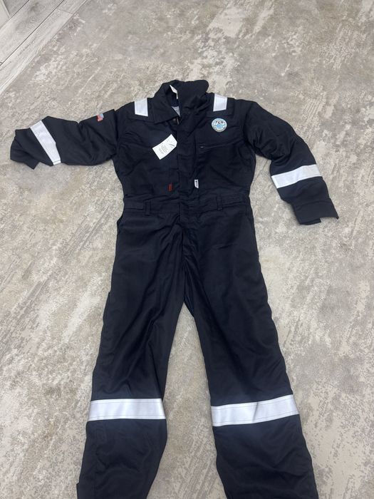 Продам демисезонный комбез новый размер 48