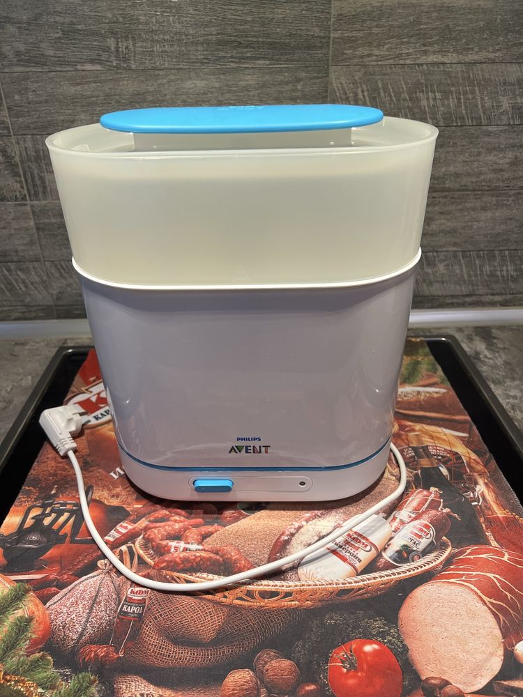 Стерилизатор Philips Avent + подарък нов отцедник