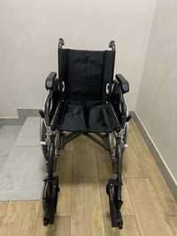 Практичная инвалидная коляска