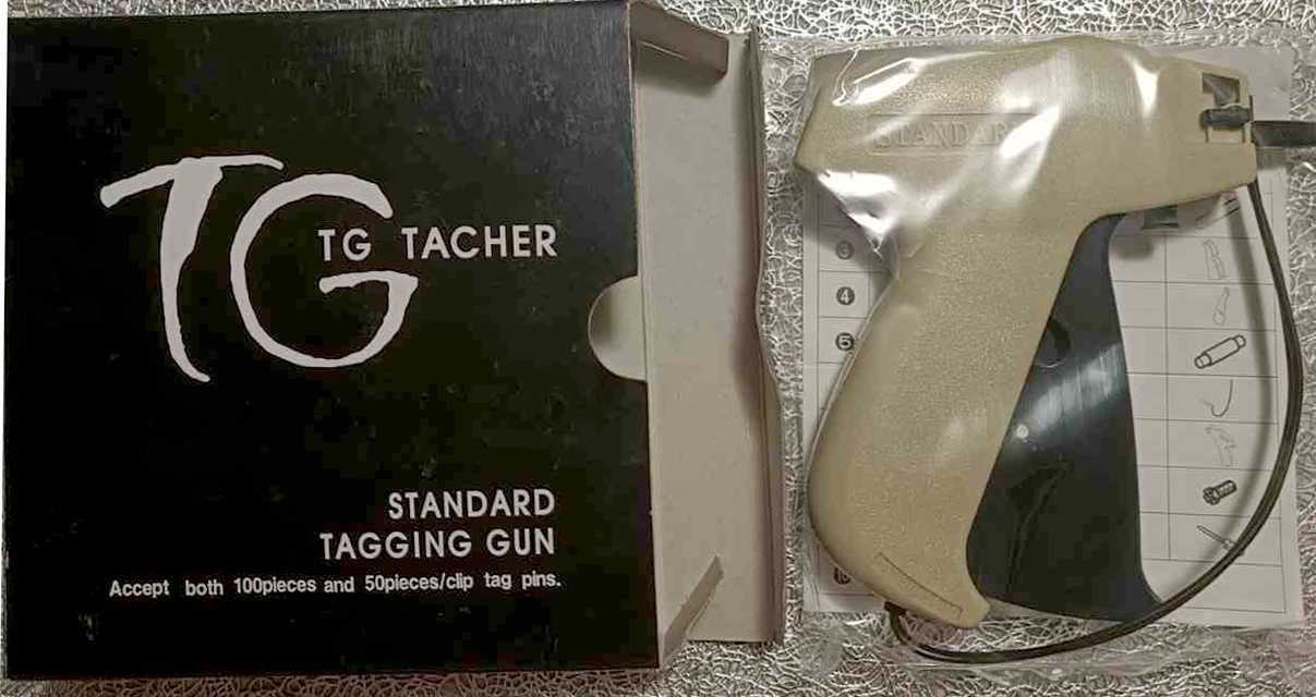 НОВ Текстилен пистолет за дрехи за  етикети + кутия със стрели