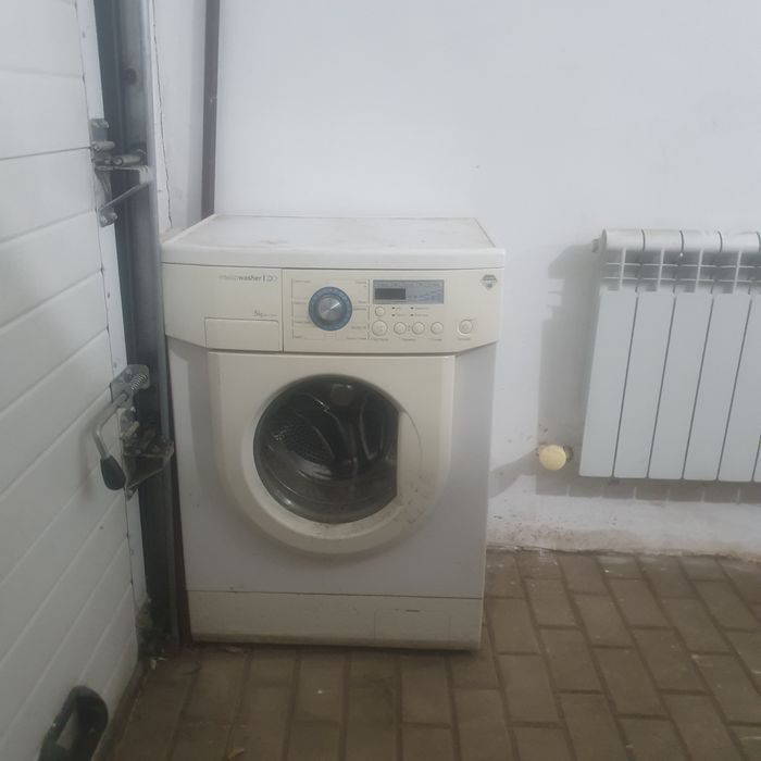 Чуть чуть сломанная стиралка.