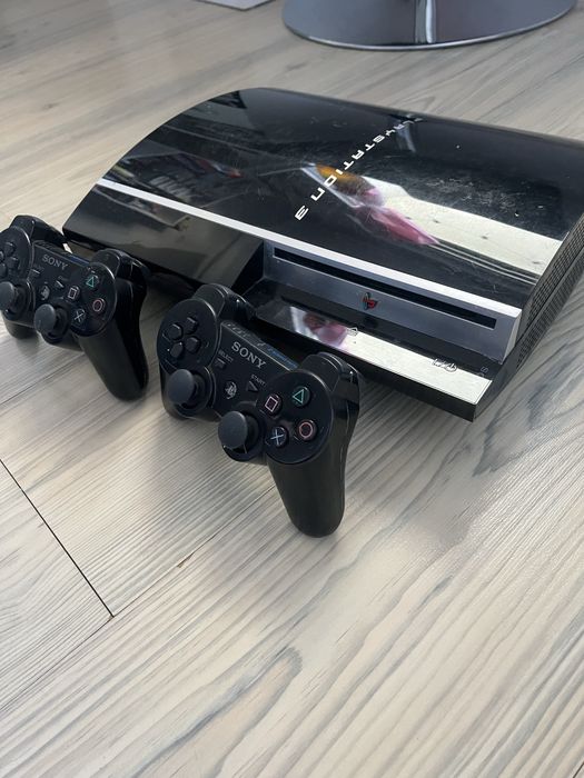 PlayStation3 + 14 игри + 2 джойстика