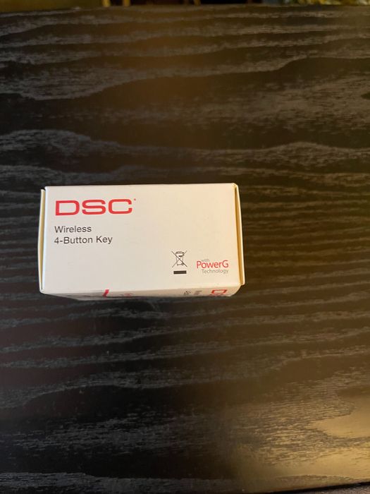 Telecomanda sistem alarma cu 4 butoane DSC seria Neo.