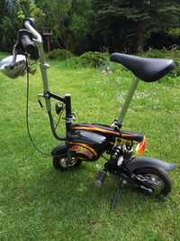 Mini scuter electric. Trotineta electrica cu sa