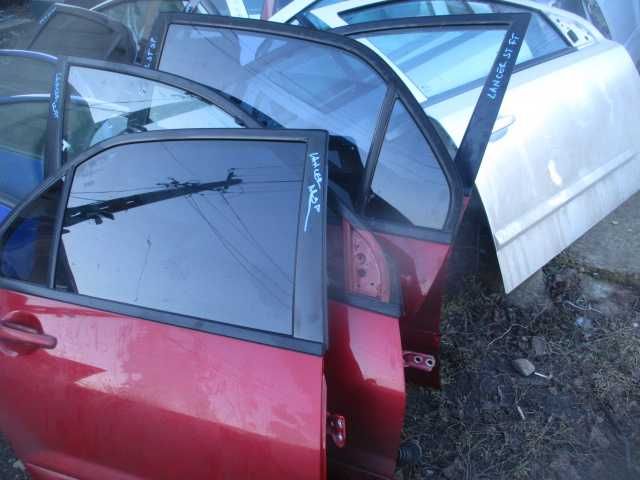 Portiera usa stanga dreapta fata spate MITSUBISHI LANCER an 2006