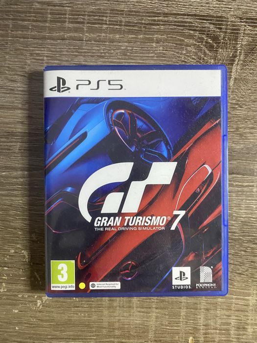 PS5 Slim cu 2 manete si joc Gran Turismo 7