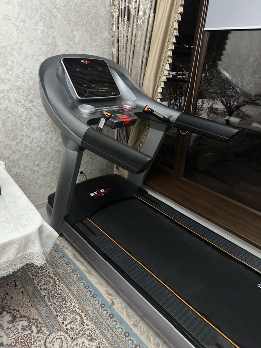 Спартивний беговой дорожка