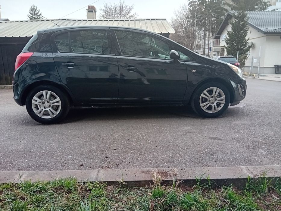 Opel corsa 1.4 benzină, fab,  2012,scaune încălzite,  volan încălzite!