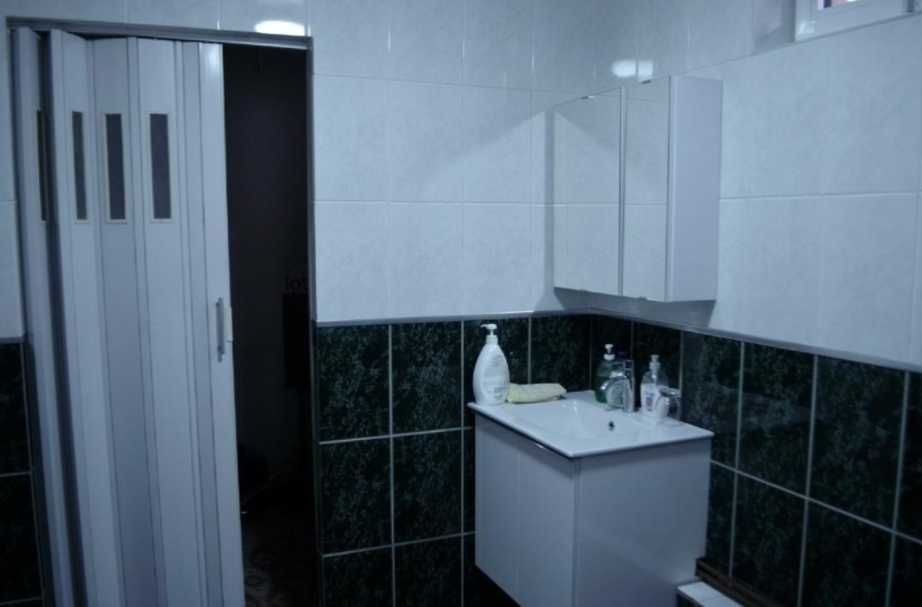 Proprietate 1780m2 cu 2 case/livada/garaj