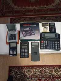 Calculatoare de birou,masă,buzunar,unele cu ceas,alarmă,calendar,dual