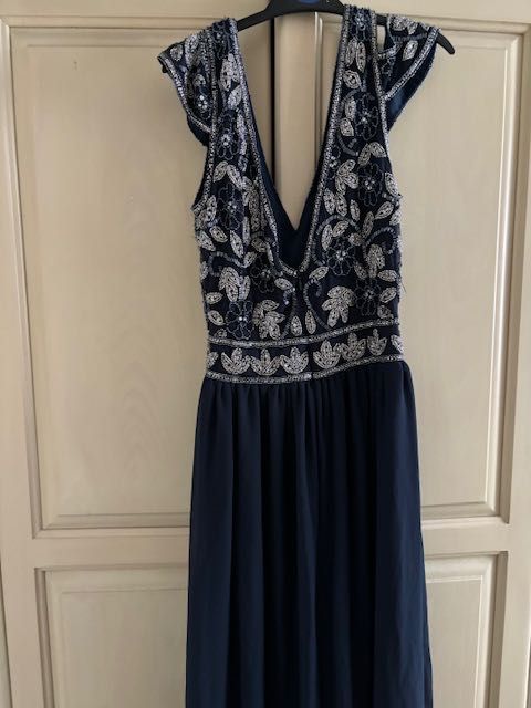 Нова маркова рокя Lipsy London размер С