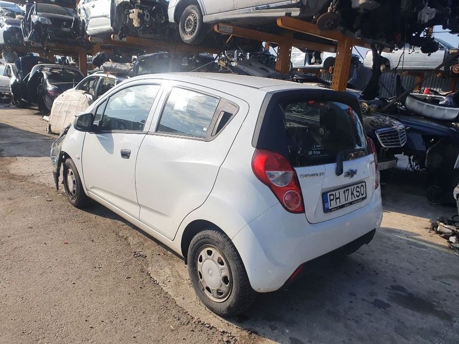 Dezmembrez Chevrolet Spark motor 1.0 benzina 68 cp, LMT kit pornire ambreiaj volanta plafon bara compresor ac dezmembrari