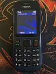 Nokia 100 cu butoane,lanternă,radio FM,baterie 5 zile, incarcator