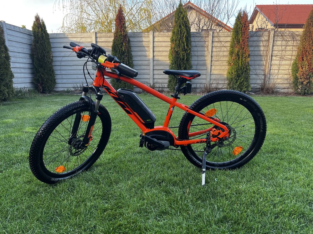 Bicicleta electrica copii KTM 24" Macina Mini Me oranj/negru