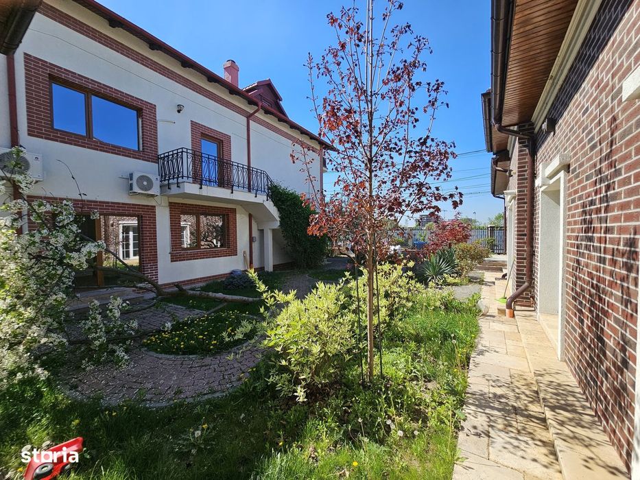 Casă spațioasă de închiriat cu curte amenajată și facilități complete