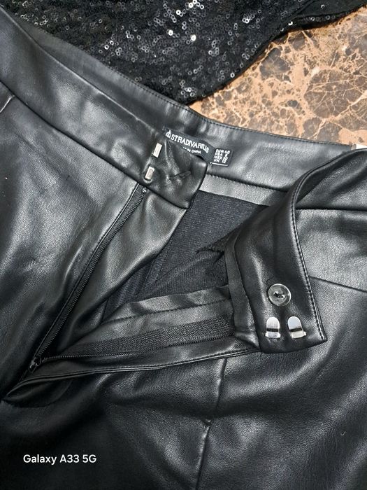 Seta dama pantaloni de piele și top cu paiete