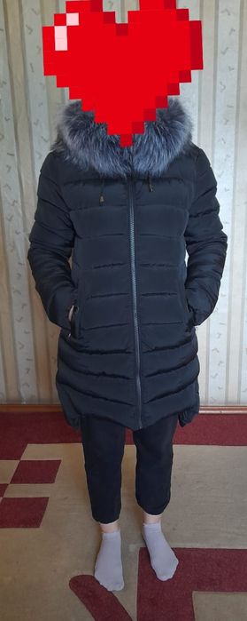 Продам пуховик новый
