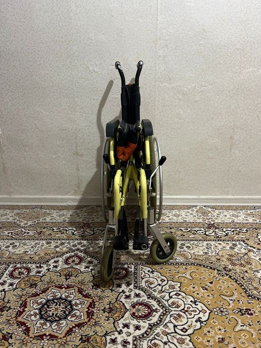 Инвалидная коляска