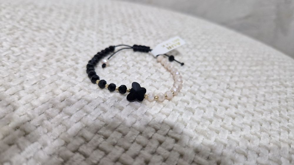 Bratara pe snur cu bilute din aur de 14K