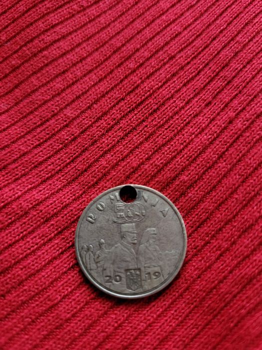 Monedă forate rară