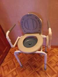 Санитарный стул- туалет новый с откидными подлокотниками.