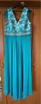 Rochie turcoaz in stare buna.