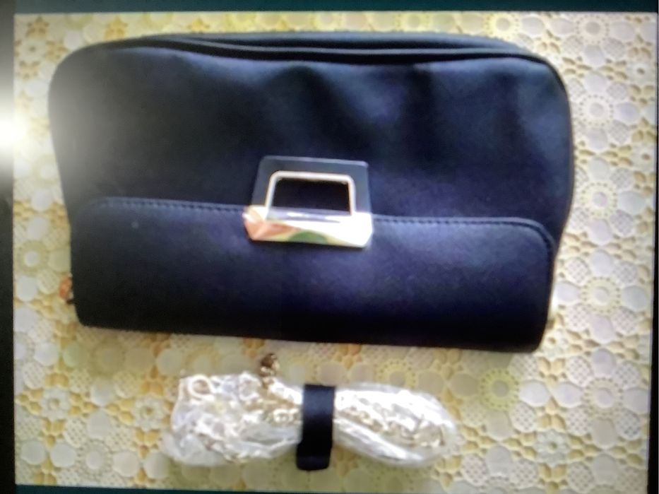 Черный клатч с пряжкой