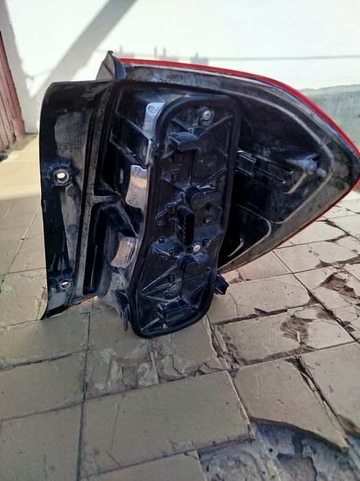 Фонарь левый задний Шевроле кобальт