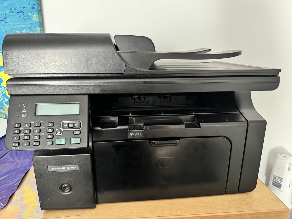 Принтер МФУ HP LaserJet Pro M1212nf MFP черный