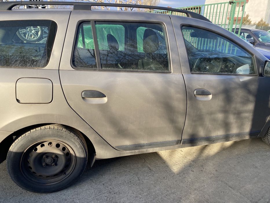 Aripă dreapta spate Dacia Logan MCV 2014