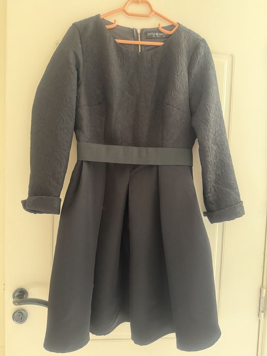 Елегантни дамски рокли