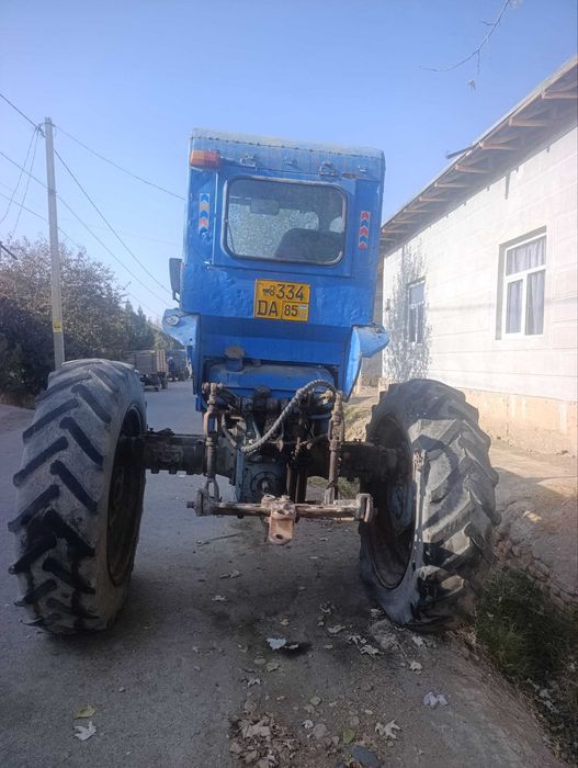 T 28 traktor kafolati bilan...