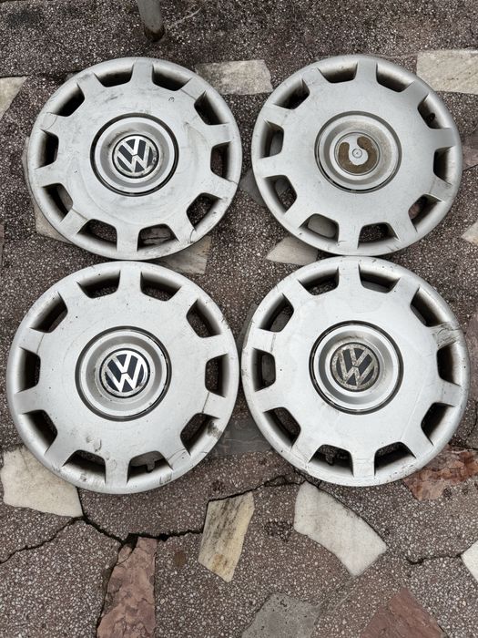 Vând set 4 cauciucuri de iarnă Volkswagen + 4 capace VW