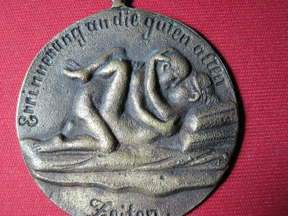 Medalie,medalion,sexualitate explicita,Germania.
