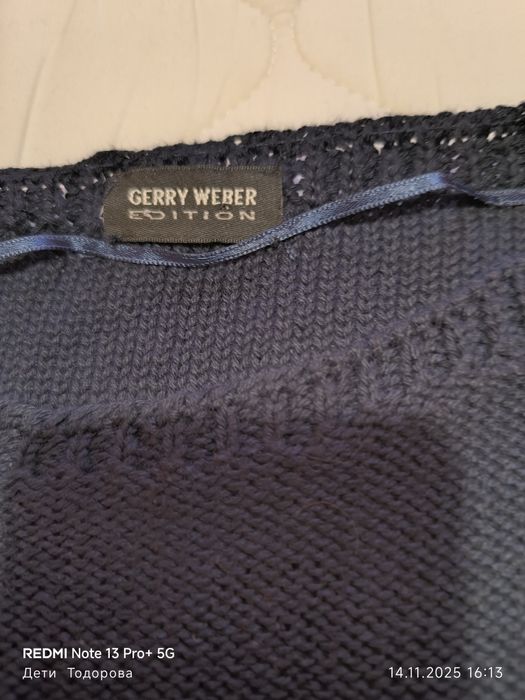 Продавам чисто нов,дамски черен пуловер без ръкави Gerry Weber.