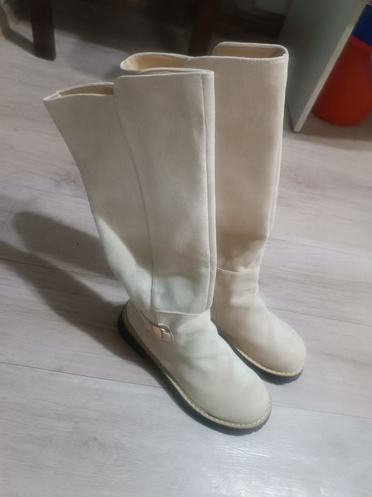 Продам сапоги обсолютно новые .