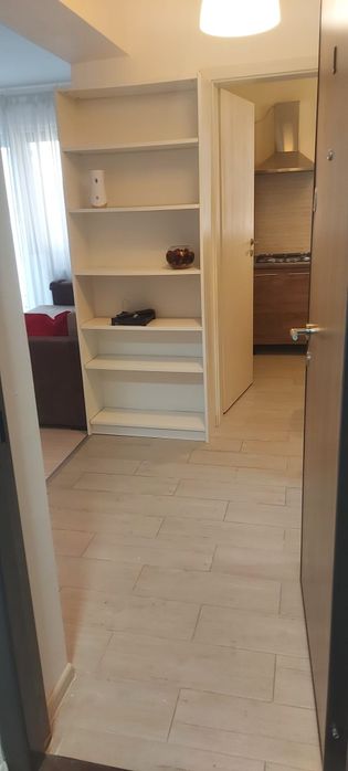 Garsoniera cu curte de inchiriat