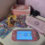 Nintendo switch lite coral + игри и калъфи подарък