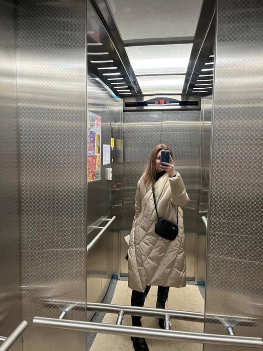 Продам зимний пуховик