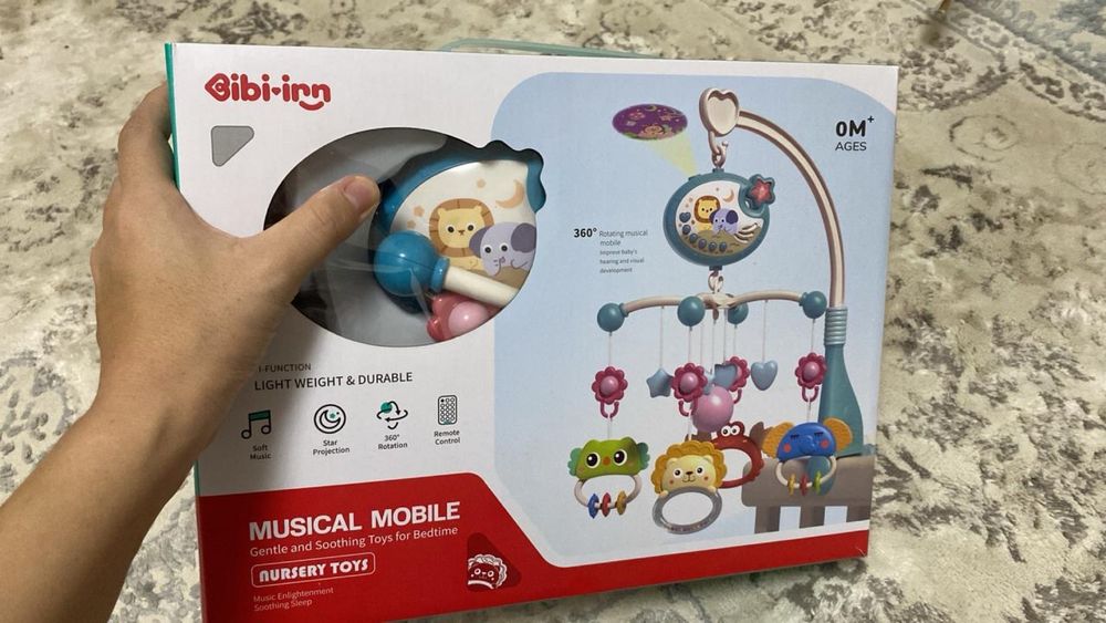 Игрушка для кровати